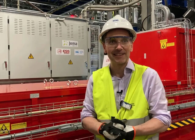 RF group leader, Morten Jensen standing in front of  klystron in the Klystron Gallery in the ESS Accelerator buildings.