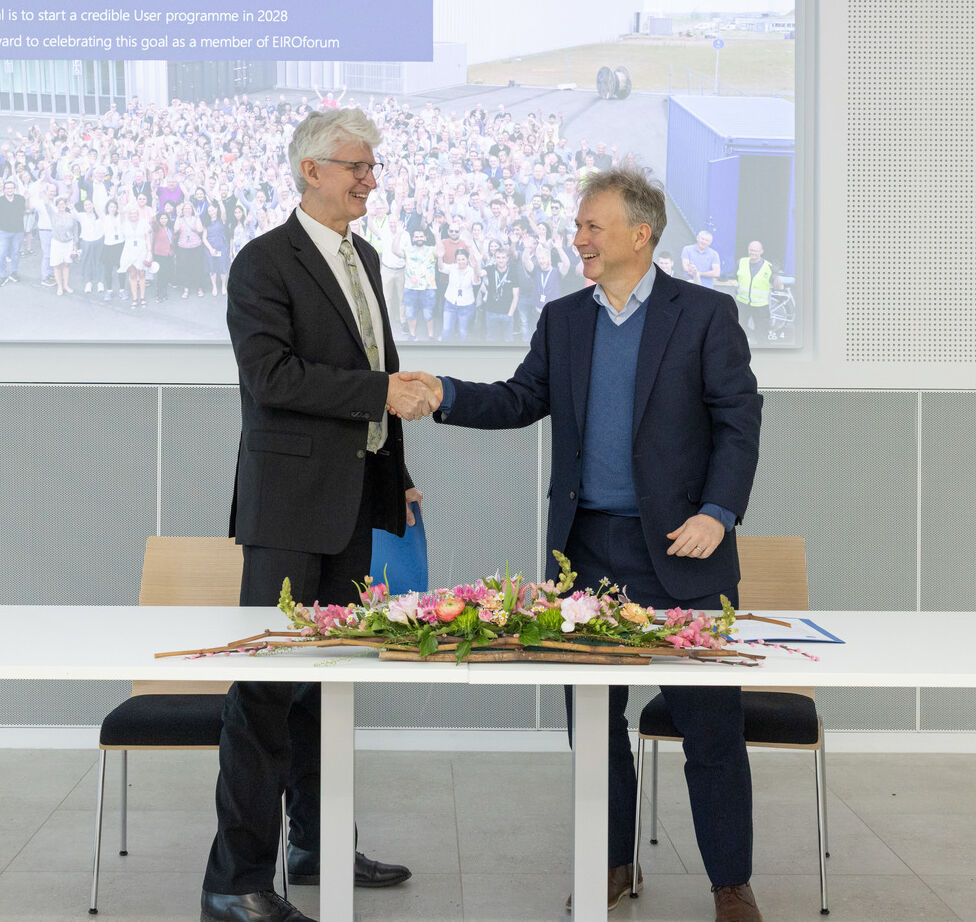 ESS Director General Helmut Schober and EMBL Interim Director General Ewan Birney shake hands at the signature ceremony