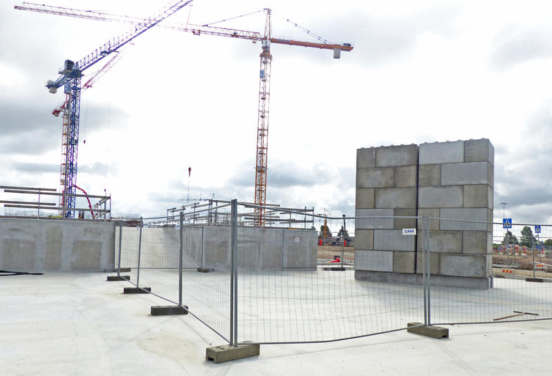 Load-testing with concrete blocks on the long-range instrument hall base slab.