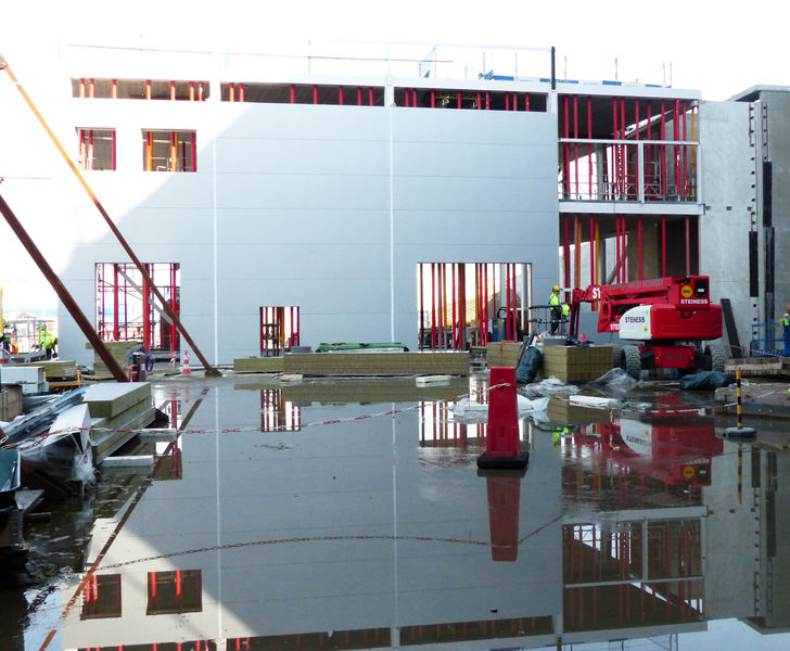 Sandwich panel installation for the lab to Experimental Hall 2.