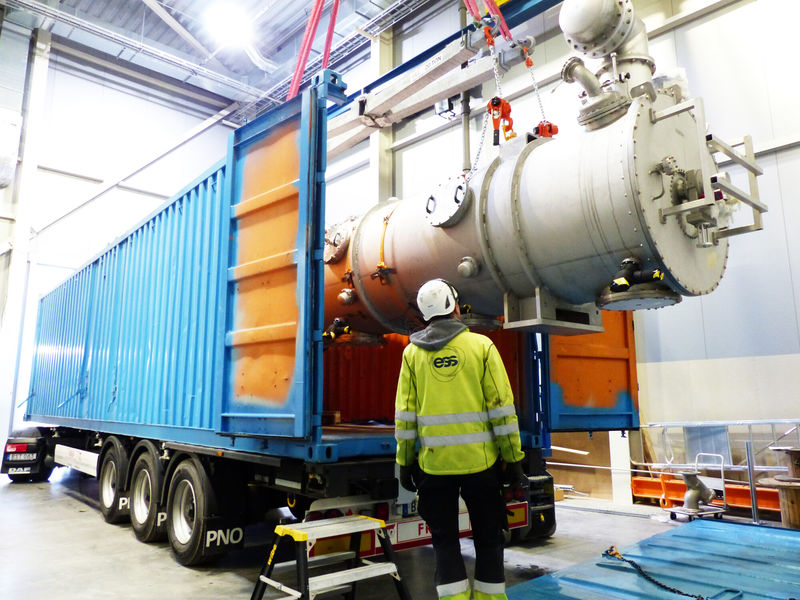 The first proper ESS cryomodule is carefully lifted out from the lorry