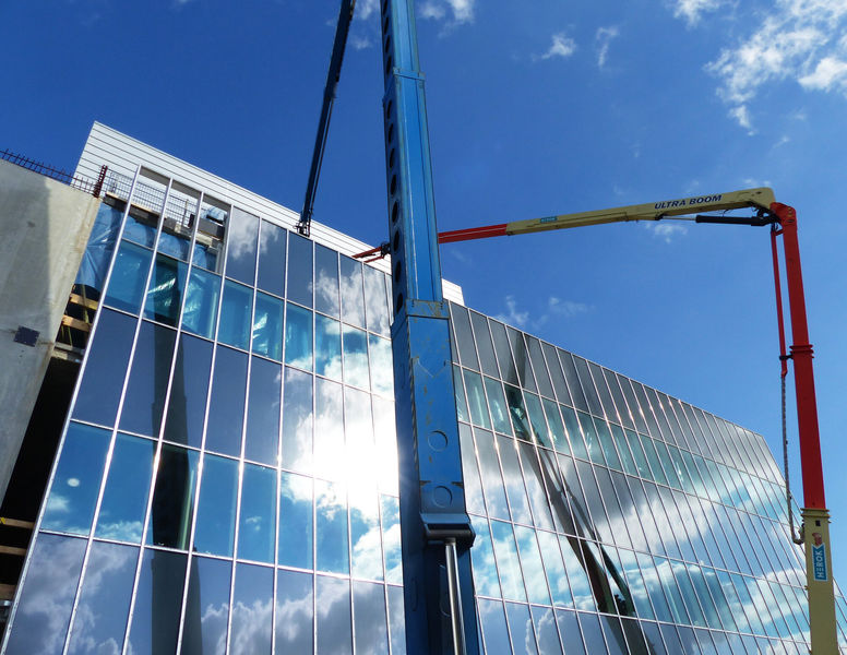 Target entrance building glass facades with steel cladding ongoing on high bay level